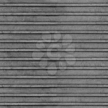 Dark gray rough wooden wall. Square seamless background photo texture