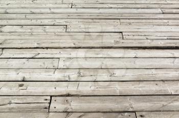 Uncolored old gray wooden floor. Background photo texture