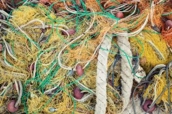 Colorful fishing net drying on pier in Greece, background photo