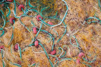 Colorful fishing net drying on a pier, background photo