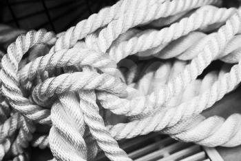 White nautical rope bundle, close up monochrome photo