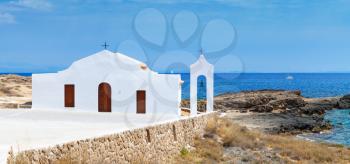 Agios Nikolaos. Small white Orthodox church on the Sea. Coast of island Zakynthos, Greece