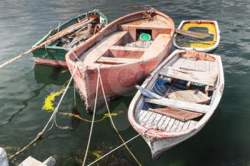Old small fishing boats moored in port of Avcilar, Istanbul, Turkey
