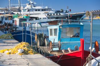 Colorful wooden fishing boats moored in port of Zakynthos, Greece