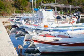 White wooden fishing boats moored in bay of Tsilivi. Zakynthos, Greek island in the Ionian Sea