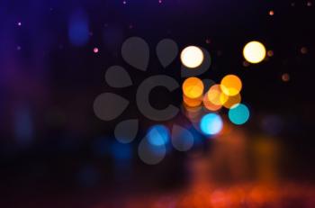 Colorful blurred lights, bokeh effect. Abstract photo background