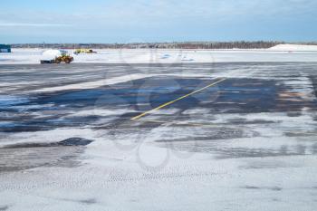 Snowy empty runway field. Turku airport in winter, Finland