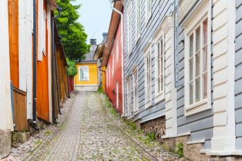 Street perspective with colorful wooden houses in old town of Porvoo, Finland