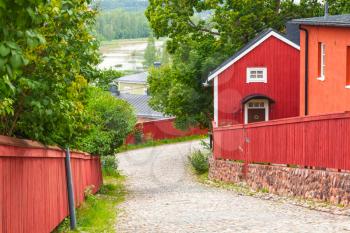Street view with red wooden houses in old town of Porvoo, Finland