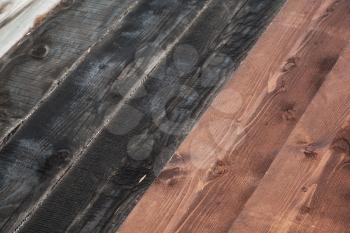 Black and brown planks. Wooden floor background photo texture