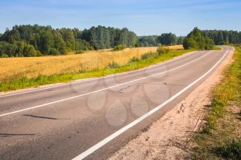 Empty turning rural highway, European road landscape