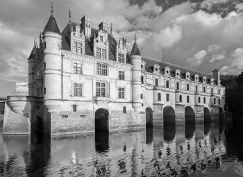 The Chateau de Chenonceau facade, medieval french castle in Loire Valley, France. It was built in 15-16 century, an architectural mixture of late Gothic and early Renaissance. Black and white
