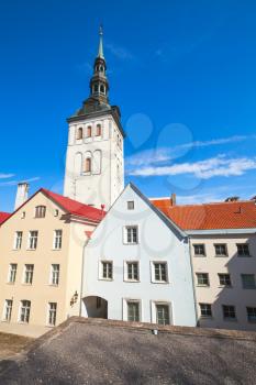 Old town of Tallinn, Estonia. Vertical skyline photo with colorful houses and St. Nicholas Church, Niguliste Museum