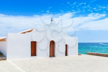 Agios Nikolaos. White Orthodox church on the Sea coast. Zakynthos island, Greece