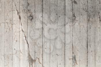 Rough gray concrete wall with cracks, flat detailed background photo texture