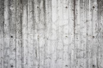 Rough gray concrete wall, flat detailed background photo texture