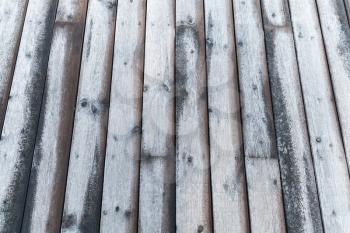 Photo background of wooden pier floor with frost over it
