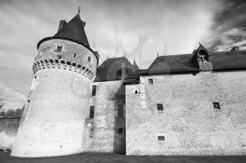 The Chateau de Fougeres-sur-Bievre, medieval french castle in Loire Valley. It was built in 15 century, black and white photo
