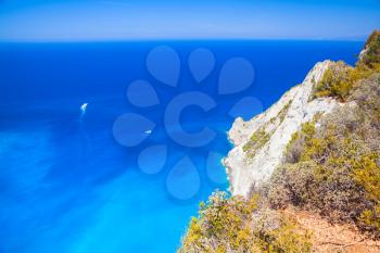 Navagio bay landscape. Rocky coast under blue sky, natural landmark of Greek island Zakynthos