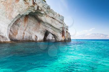 Blue caves, coastal rocks of Greek island Zakynthos with stone arches natural landmark, popular touristic destination