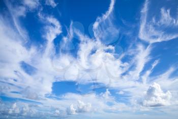 Blue sky with white altocumulus and cirrus clouds layers, natural background photo texture