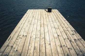 Empty old wooden pier perspective, vintage tonal correction filter, old instagram style effect
