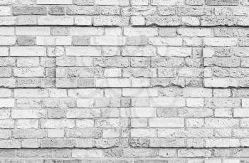 Old white brick wall with decorative rectanglular relief pattern, background photo texture