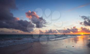Colorful seascape in sunrise. Atlantic Ocean coast, Bavaro beach, Hispaniola Island. Dominican Republic, coastal landscape