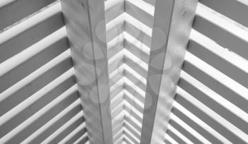 Abstract white wooden architecture fragment, railings corner made of planks. Close up photo with selective focus