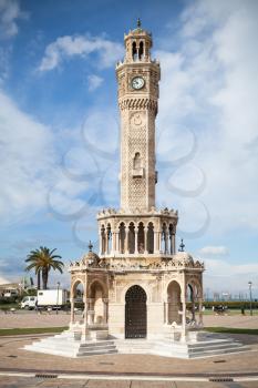 Konak Square street view with historical clock tower, it was built in 1901 and accepted as the official symbol of Izmir City, Turkey, it was built in 1901 and accepted as the official symbol of Izmir 
