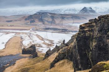 Mountain coastal landscape. Rock North Atlantic Ocean coast. Vik district, Iceland