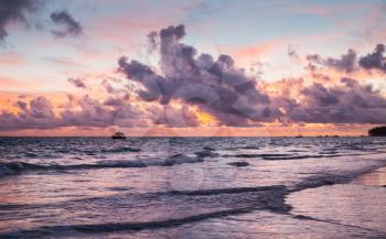 Colorful coastal landscape. Atlantic Ocean coast at sunset. Bavaro beach, Hispaniola Island. Dominican Republic