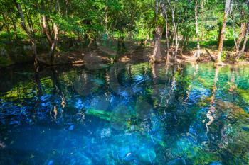 Still blue lake in tropical forest, natural landscape of Dominican Republic