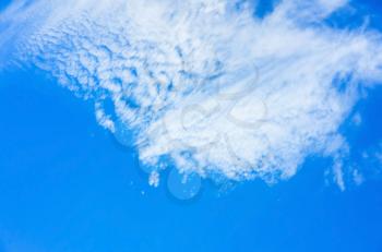 Blue sky with layer of white clouds, natural background photo texture