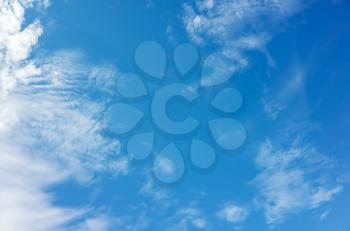 Blue sky with white altocumulus and cirrus clouds, natural background photo texture