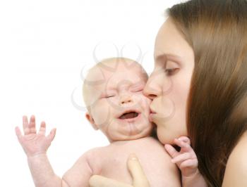 Mother kiss her crying baby