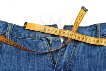 Jeans and tape measure isolated