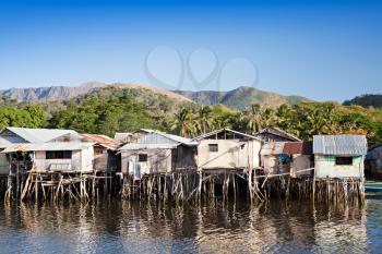 Slum houses staying on stilts in the sea