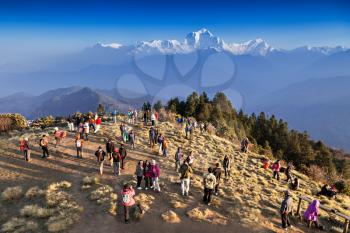 POON HILL, NEPAL - MAY 02: Many people looking for sunrise at Himalayas on May 02, 2012, Poon Hill, Nepal