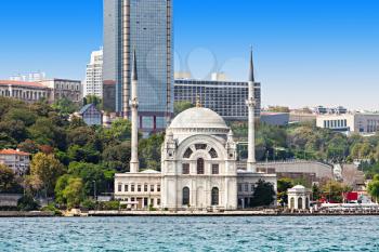 The Dolmabahce Mosque is in Istanbul, Turkey. It was commissioned by queen mother Bezmi Alem Valide Sultan.