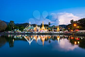 Lake with Wat Chong Klang and Wat Chong Kham temples on sunset, Mae Hong Son, Thailand
