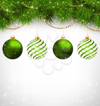 Two green and two spiral Christmas balls on green pine branches with chains on snowfall on grayscale background