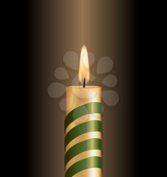 Candle with green spiral tape on brown background