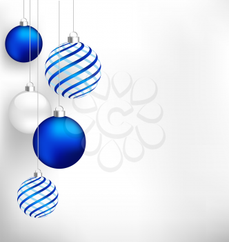 Blue spiral christmas balls hang on white background
