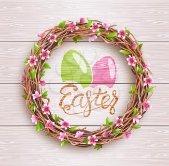 Easter Festive Twigs Wreath with Flowers on Light Wooden Background