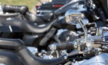 Closeup of chromed motorcycle handlebar