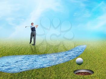 Adult businessman plays golf near a little stream