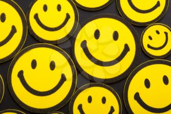 Background of many yellow smileys