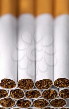 Macro view of cigarettes in a row