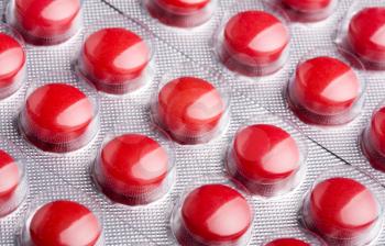 Closeup of big red pills